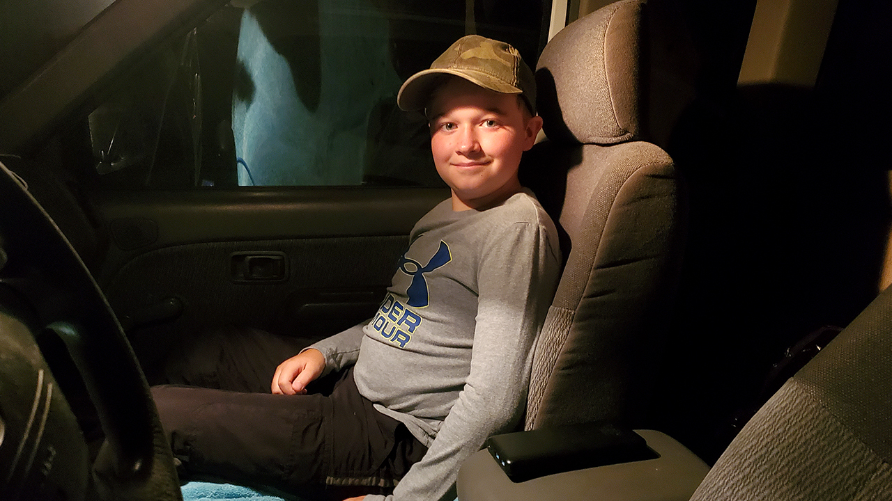 4:09 a.m. Finally got a good pic Alex’s smile before hitting the road. We buckled up first!